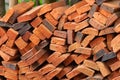 Wall of stacked red clay bricks for construction site Royalty Free Stock Photo