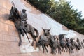 Wall statuee `Run of Bulls` at the Plaza de Toros de Las Ventas, Madrid, Spain.