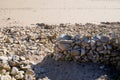 Wall stone hands made sand beach access in low tide in talmont saint hilaire vendee France