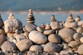 The wall of stones collected in a pyramid on the beach pebbles are not large