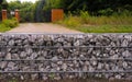 Wall of stones gabions. Arrangement of space