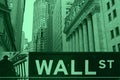Wall Street sign and New York Stock Exchange buildings Royalty Free Stock Photo
