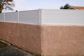 Wall street white modern barrier and fence around the house protect view home garden Royalty Free Stock Photo