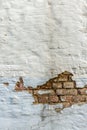 Background texture of peeling plaster on an old wall. Vertical Royalty Free Stock Photo