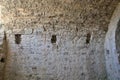 Wall surface of an interior with a semicircular vault of an ancient Roman building