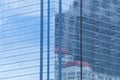 Wall of tall building or blue glass of skyscraper background. Royalty Free Stock Photo