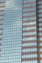 Wall of tall building or glass of skyscraper background. Royalty Free Stock Photo