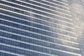 Wall of tall building or glass of skyscraper background. Royalty Free Stock Photo