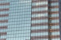 Wall of tall building or glass of skyscraper background. Royalty Free Stock Photo