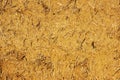 The wall texture of an adobe house made from barley straw and two kinds of clay. Royalty Free Stock Photo