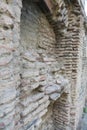 Wall texture from old raw bricks and stone. Old walls destroyed by time. Tbilisi, Georgia. Royalty Free Stock Photo