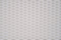 Wall texture with white rounded recesses in even rows. Futuristic background Royalty Free Stock Photo