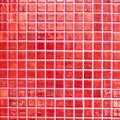 Wall tiled with red tiles