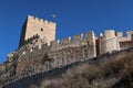 Wall and tower of the Almohad castle of Sax on top of a rock. Sax, Alicante, Spain