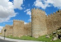 Wall, tower and bastion of Avila, Spain, made of yellow stone bricks Royalty Free Stock Photo