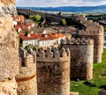 Wall Tower Bastion Avila Spain Made Yellow Stone Bricks with view of town and countryside. Royalty Free Stock Photo