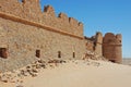 Wall and tower of castle at Abu Nujaym in Libya Royalty Free Stock Photo