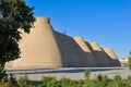 Wall and towers of the ancient citadel in Bukhara `Ark citadel`.