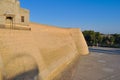 Wall and towers of the ancient citadel in Bukhara `Ark citadel`.