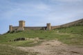 Wall and towers of Genoese fortress of the 14th century in the Sudak bay on the Peninsula of Crimea Royalty Free Stock Photo