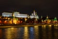 Wall and towers of Moscow Kremlin on a background of Grand Kremlin Palace and cathedrals at night with illumination Royalty Free Stock Photo