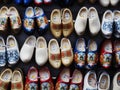 Wall of traditional painted Dutch wooden shoes, clogs, symbol of Netherlands.