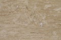 Wall of travertine with stone layers of different colors. Close up architecture macro photography. Royalty Free Stock Photo