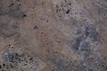 Wall of travertine with stone layers of different colors. Close up architecture macro photography. Royalty Free Stock Photo
