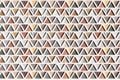 Wall with triangles of different materials in white frames Royalty Free Stock Photo