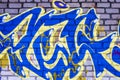 A wall vandalized with street graffiti art Royalty Free Stock Photo