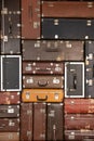 Wall of vintage antique stylish luggage cases