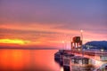 Wall and Water Gate of The Dam in Sunset Royalty Free Stock Photo