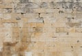Wall of white travertine adarce stone bricks Royalty Free Stock Photo