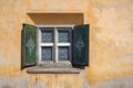 Wall and window of a house in Zuoz Graubunden, Switzerland Royalty Free Stock Photo