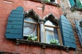 Wall with window. Medieval house in Venice.