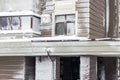 Wall with windows of modern high-rise apartment building covered with snow and frost after heavy windy snowstorm Snowfall and Royalty Free Stock Photo