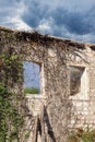 Wall and windows of old ruined house Royalty Free Stock Photo