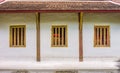 Wall and wooden windows of Buddha image hall of Wat Phra Sing