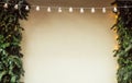 Wall with wreath of lamps, Christmas pines and lights and decorations, winter festive background Royalty Free Stock Photo