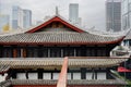 Walled ancient Daci monastery in downtown Chengdu on cloudy day