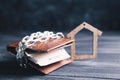 Wallet on chains and house on the table Royalty Free Stock Photo