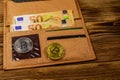 Wallet with fifty euro bills and bitcoins on wooden background Royalty Free Stock Photo