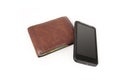 A wallet with a modern cellphone