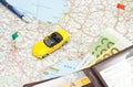Wallet, Pen And Sport Car On Map Of Europe