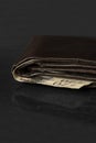 Wallet with twenty pound notes on a table Royalty Free Stock Photo