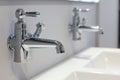 wallmounted faucets paired with matching sink units Royalty Free Stock Photo