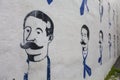 Wallpainting of men with a big mustache