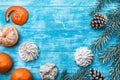 Wallpaper of azure wood, open, sea. Mandarins. Green fir tree. Decorative cones. Holidays for holidays.