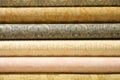 Wallpaper with floral patterns for the wall. Rolled up rolls of expensive high quality wallpaper. Various textures colors