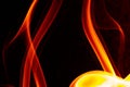 Wallpaper of red fire flames smoke against the black background Royalty Free Stock Photo